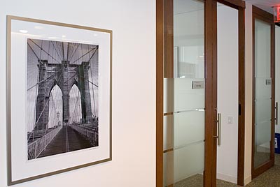 Black and white photo of the Brooklyn Bridge at Moody's Corp. New York Headquarters